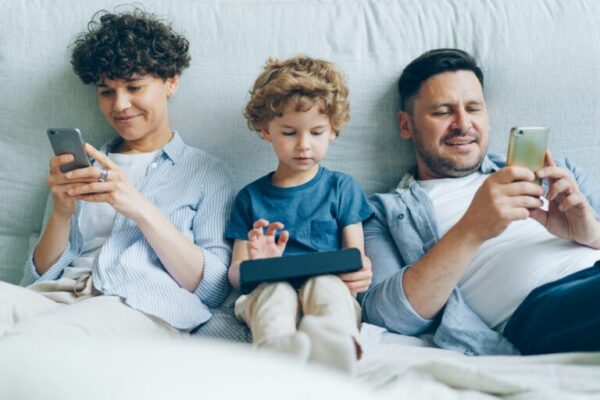 Family spending quality time together on devices